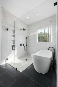 A shower enclosed in glass.