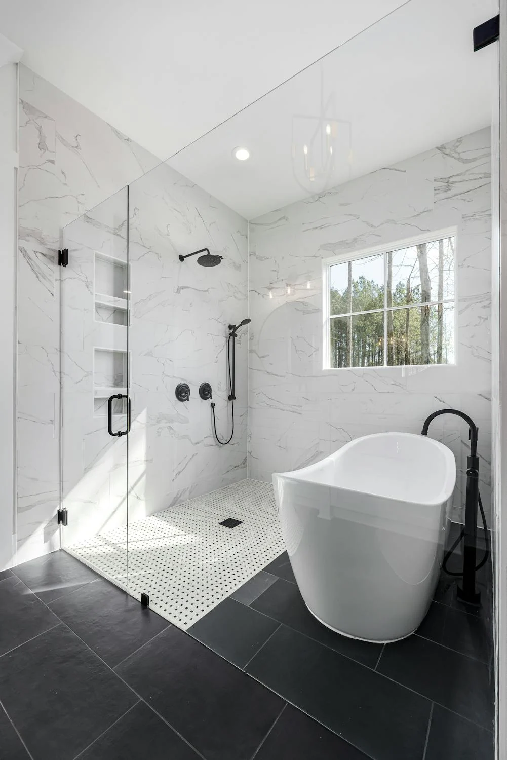 A shower enclosed in glass.