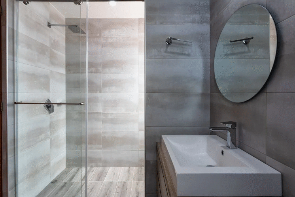 modern bathroom with a glass covered walk-in shower