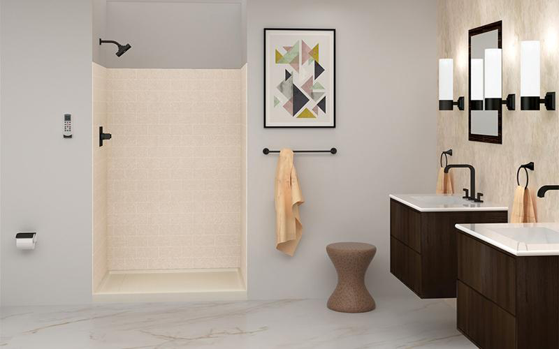 An image of a modern bathroom showcasing a walk-in shower, wash basins, and cabinets.