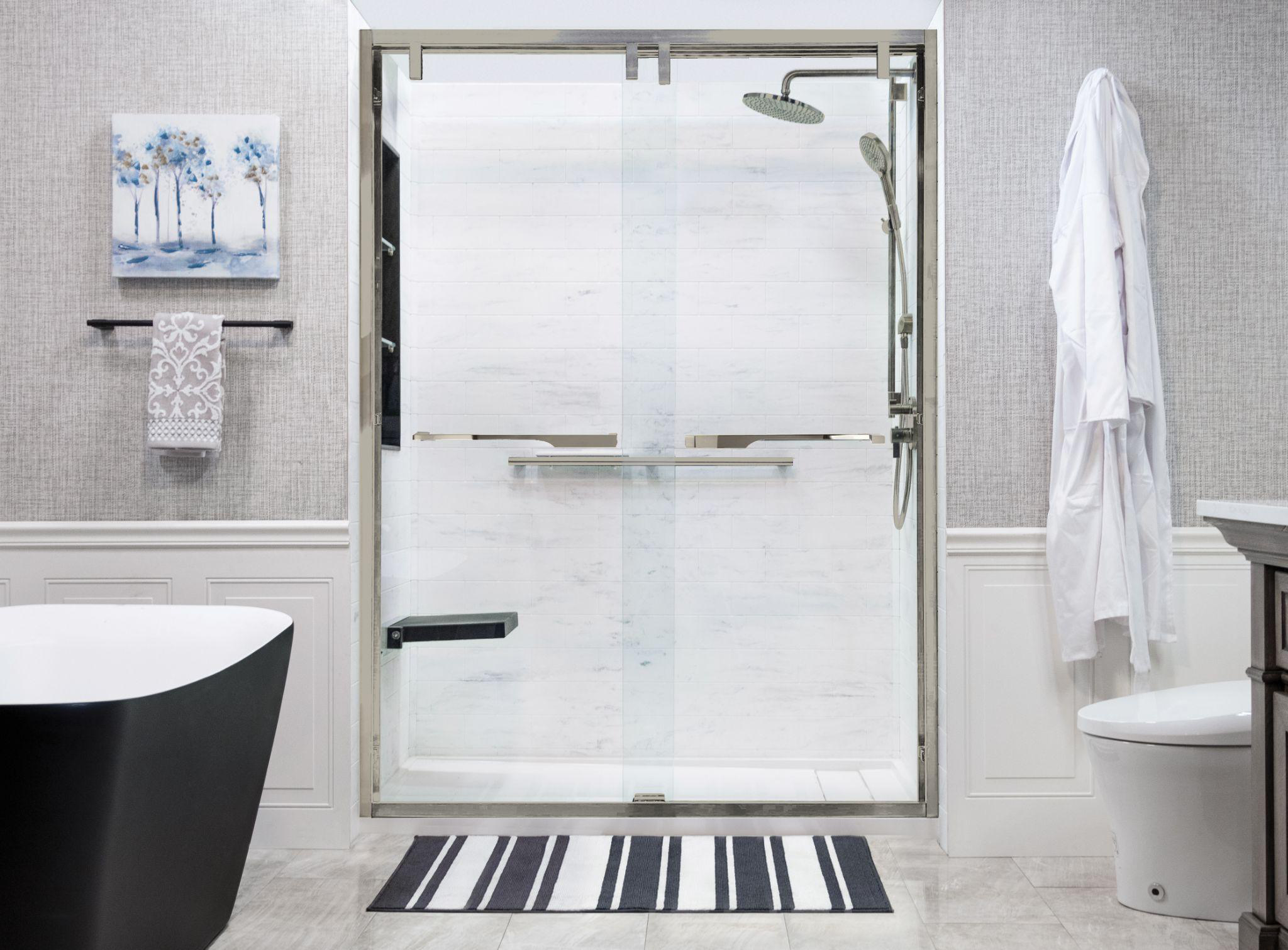 3D rendering of a bathroom with a marble-walled shower stall, black bathtub, and a toilet.