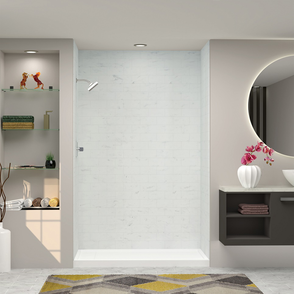 Image of a bathroom with white shower stall, a vanity with a round mirror over it, and shelves with decorations.