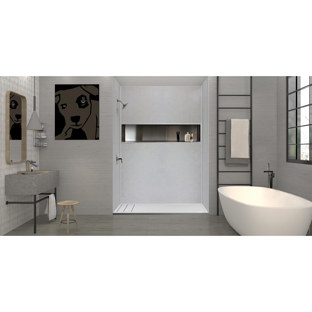 Image of a spacious bathroom with natural lighting, a bathtub, a shower stall, a vanity, and decorations.