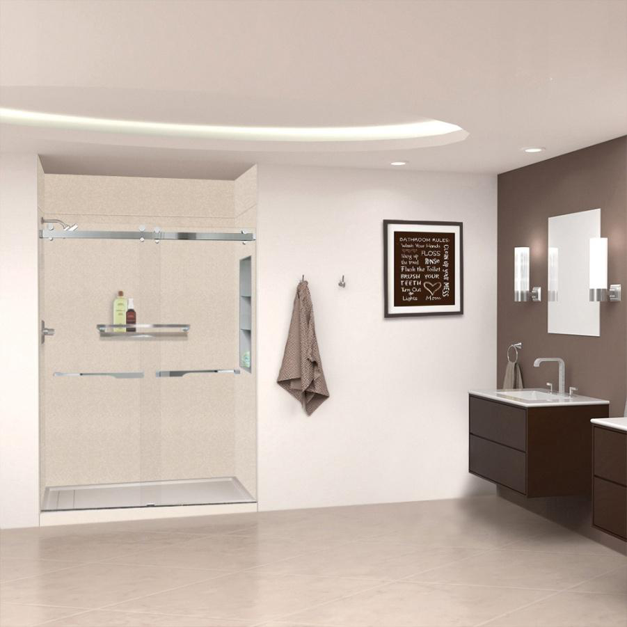 Renovated bathroom featuring updated shower, tile walls, and contemporary finishes.